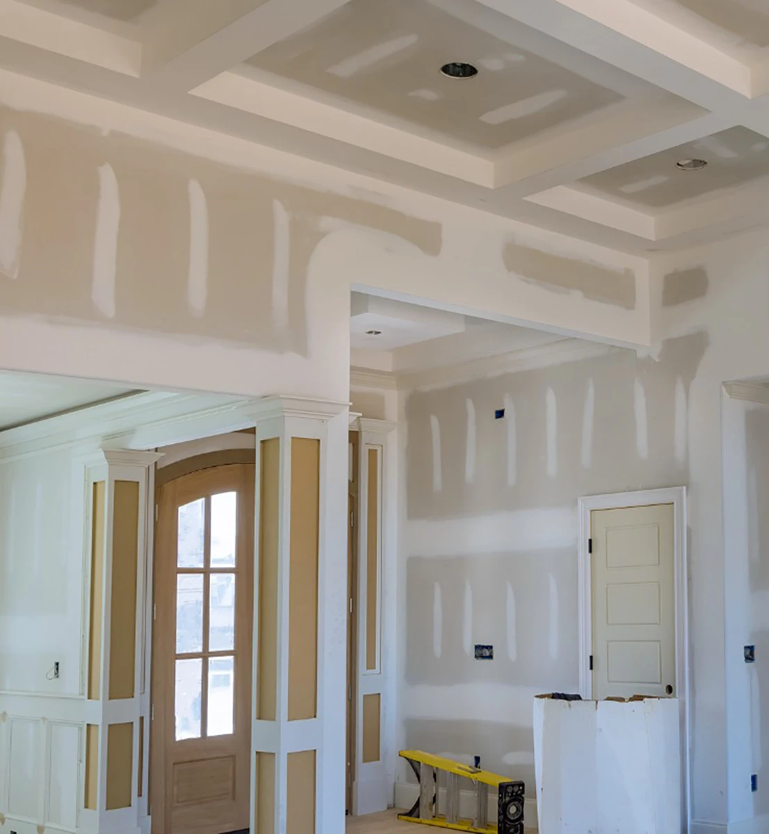 Drywall being mudded for an interior home renovation